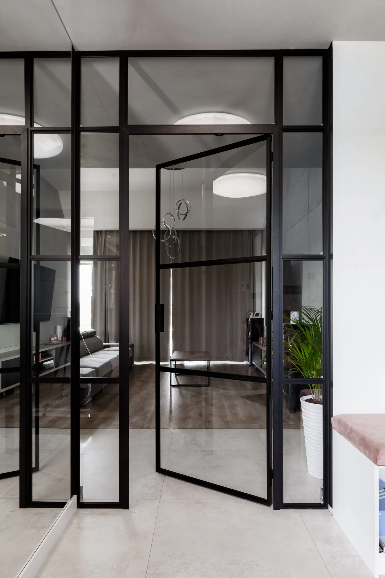 Glazed loft partition in a hall